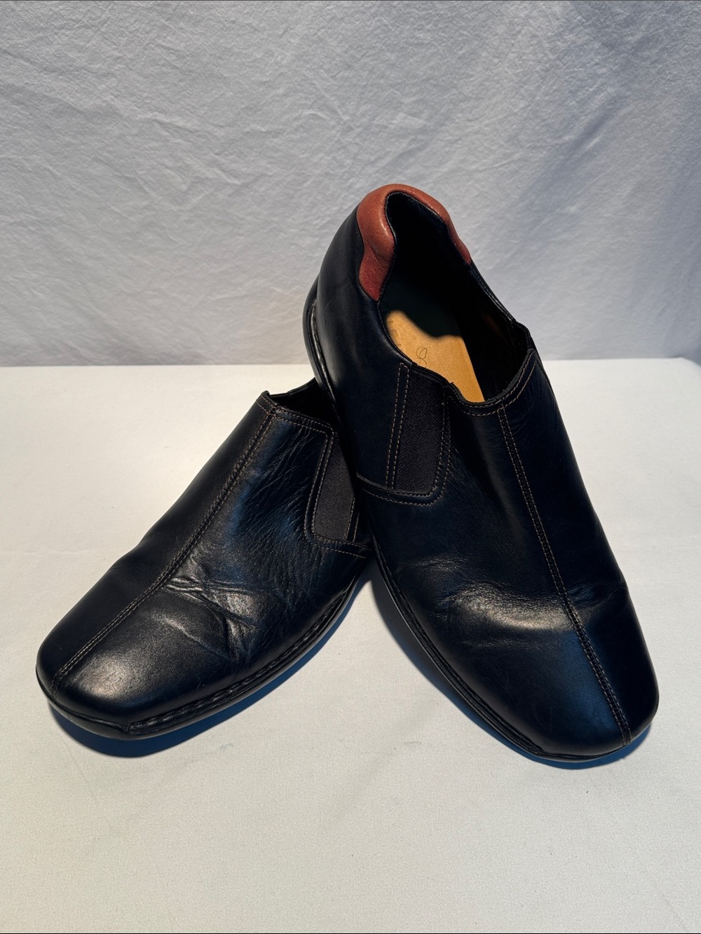 Cole Haan Black Leather Slip-On Loafers with Brown Heel Tab